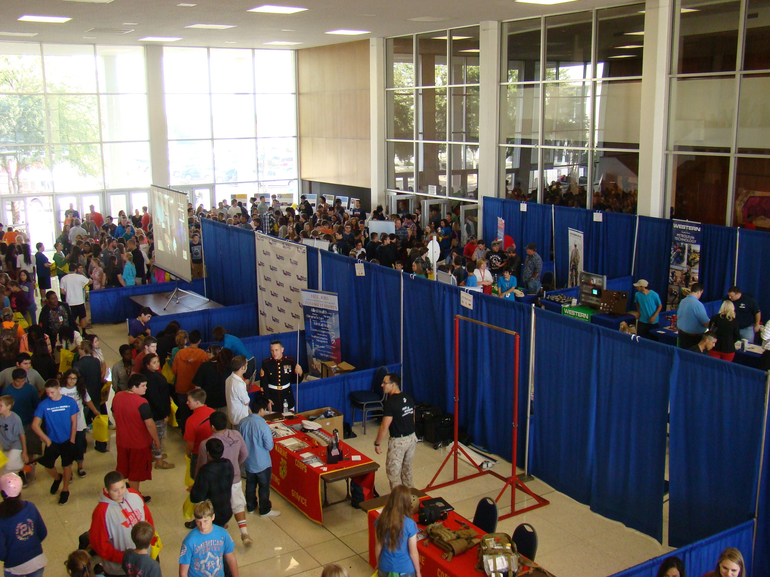 Students visiting foyer exhibitors